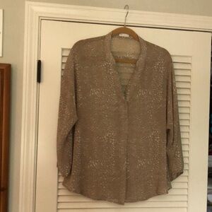 Cute, comfortable blouse!  CF brand size medium.